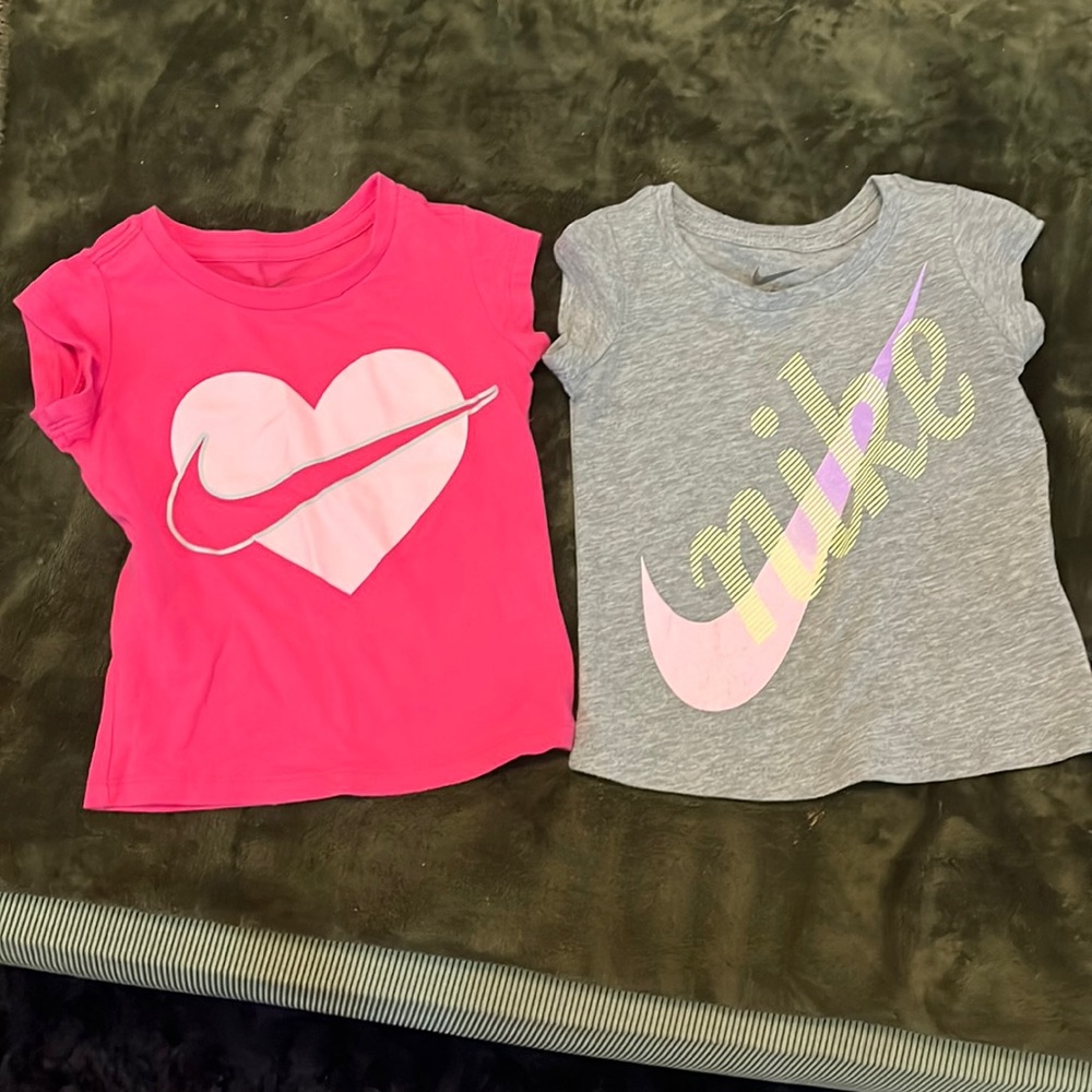 Two Nike shirts